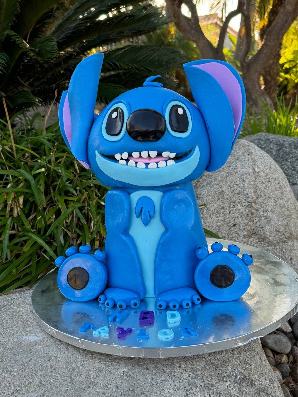 Hand-sculpted Stitch character birthday cake